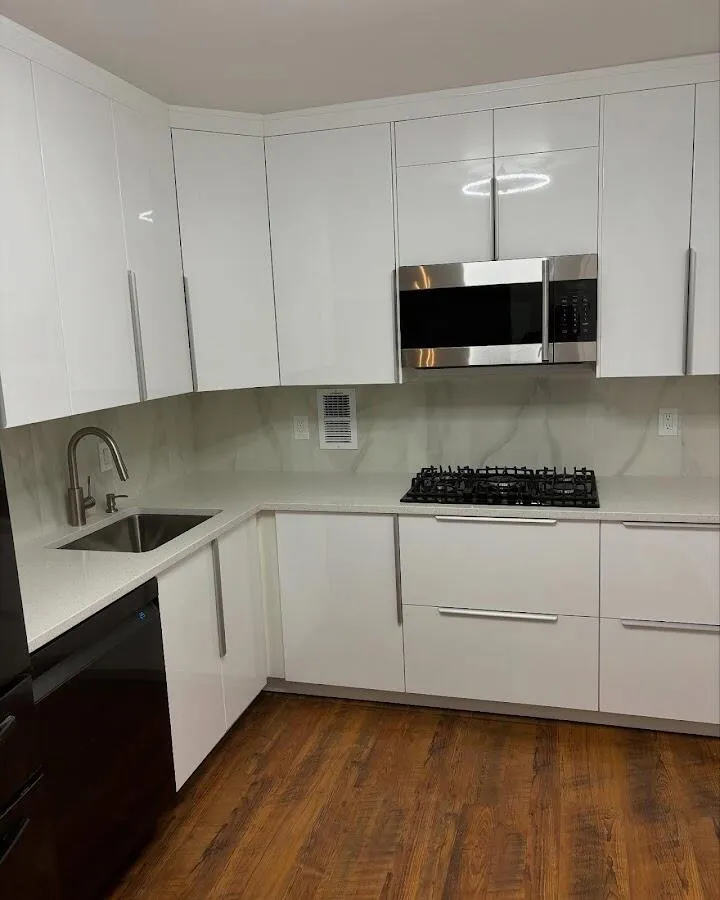 Restored kitchen with white cabinets after water damage in Ivins
